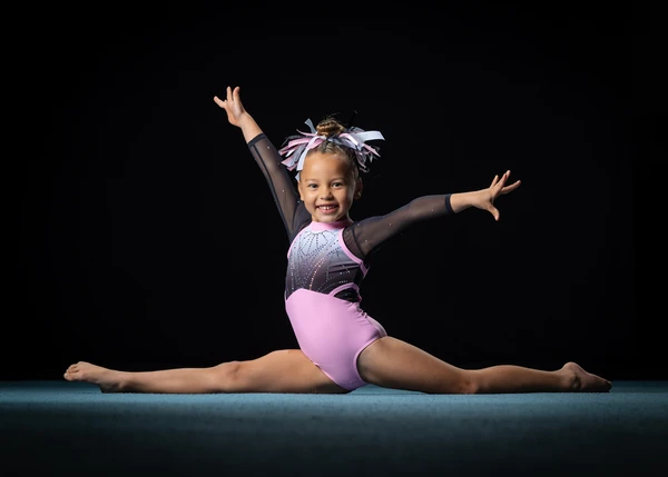 Girls team gymnast smiling